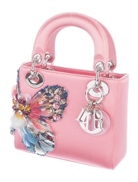 christian dior butterfly purse.